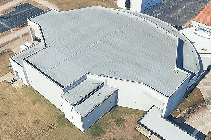Aerial Google Earth view of the church with its large white roof